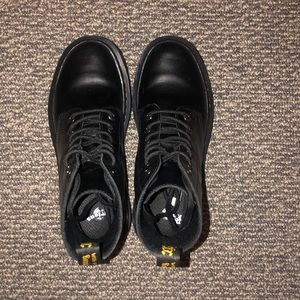 Dr. Martens black slight shine boots